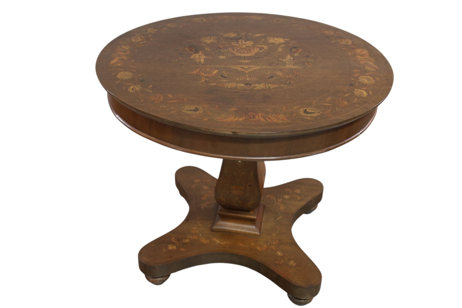 INLAID PARLOR TABLE: FLORAL AND FIGURAL INLAID PARLOR TABLE, MARQUETRY STYLE. WEAR TO FINISH. STAINS. 32" DIAM x 28" H. THIS ITEM EXCEEDS SIZE LIMITATIONS FOR IN HOUSE SHIPPING, MUST BE SHIPPED VIA 3rd PARTY GROUND