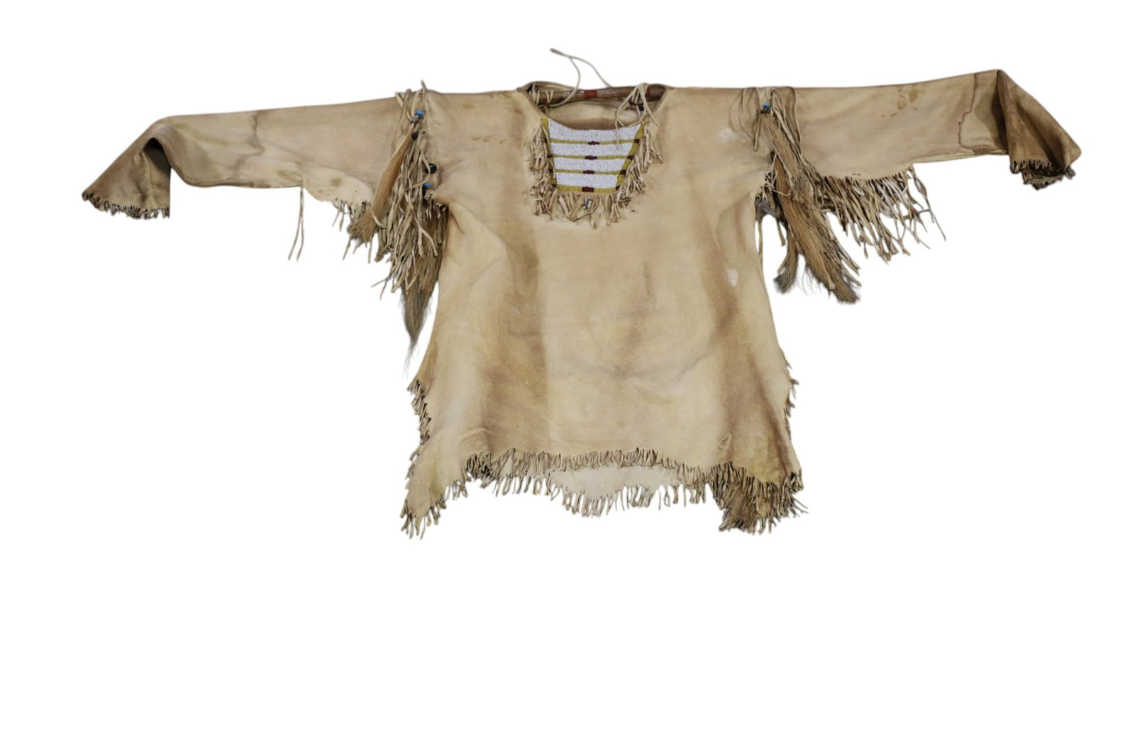 NATIVE AMERICAN WAR SHIRT: NATIVE AMERICAN WAR SHIRT, LEATHER AND BEADED DECORATION. 69" W ARM TO ARM. 32" L.