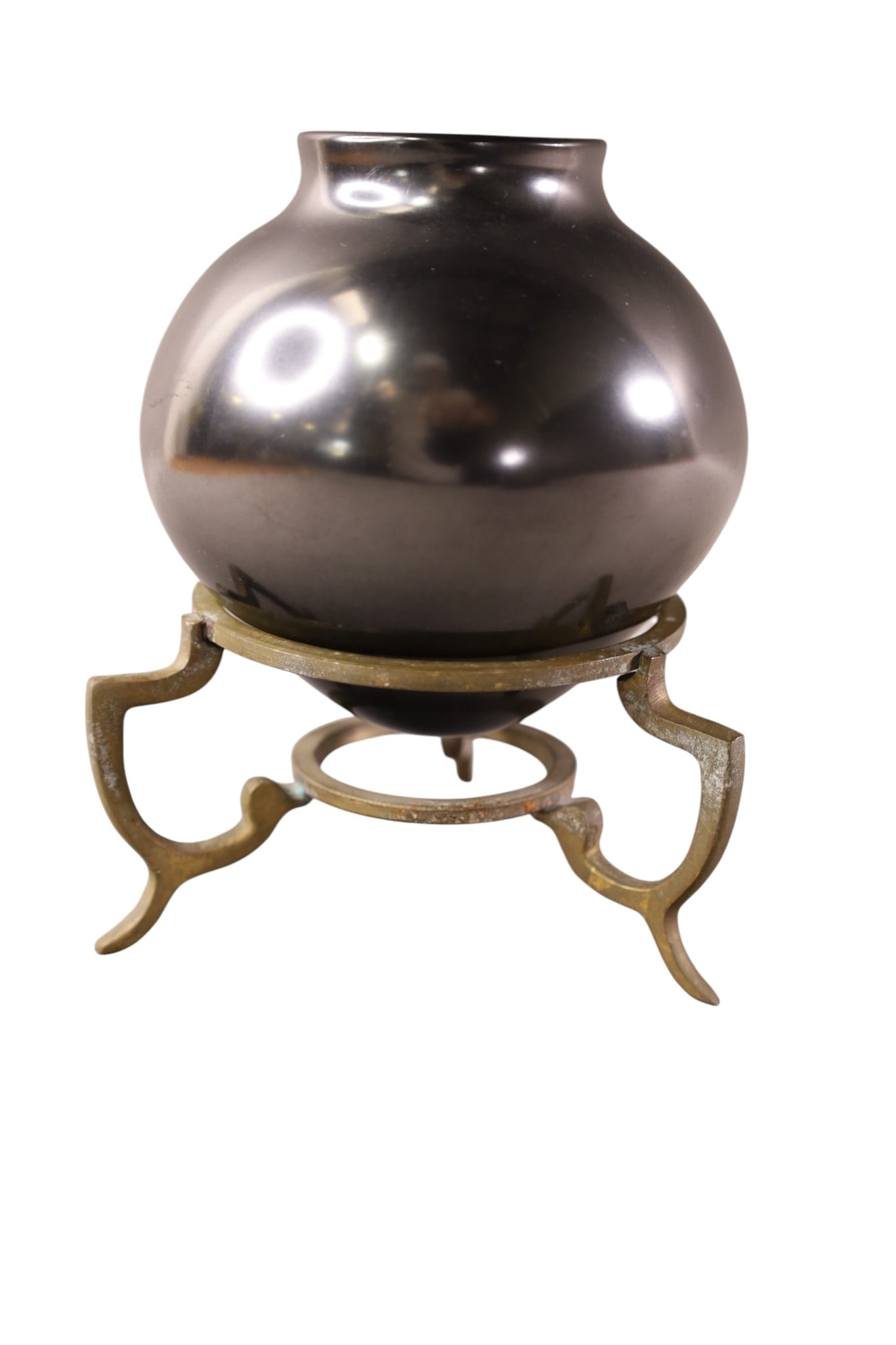IRMA ANDANA POTTERY VASE: IRMA ANDANA BLACKWARE POTTERY VASE, IN HOLDER. 4" H.