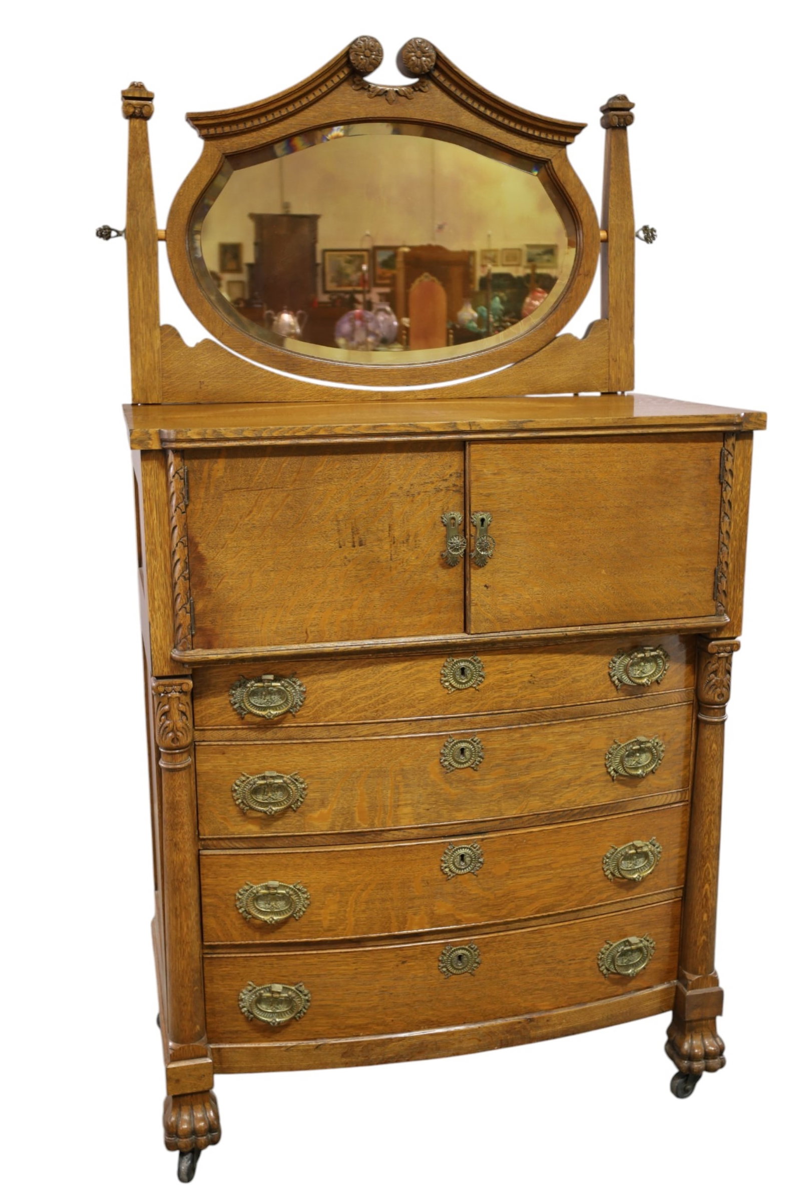 1900'S AM. OAK HIGHBOY: OAK GENTLEMAN'S CHEST, CLAW FOOT, MIRRORED UPPER, 4 DRAWERS. NO KEY. 40" W x 22" D x 75" H. THIS ITEM EXCEEDS SIZE AND WEIGHT LIMITATIONS FOR IN HOUSE SHIPPING, MUST BE PICKED UP IN HOUSE OR SHIPPED