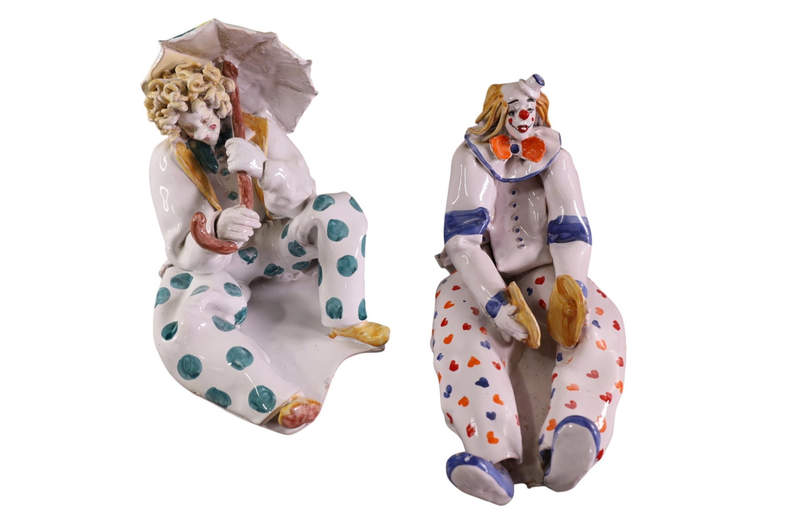 2 ITALIAN CLOWNS: HAND PAINTED TERRA COTTA CLOWNS, MARKED ON BASE. SEATED CLOWN HAS CRACKS. 14" & 15"