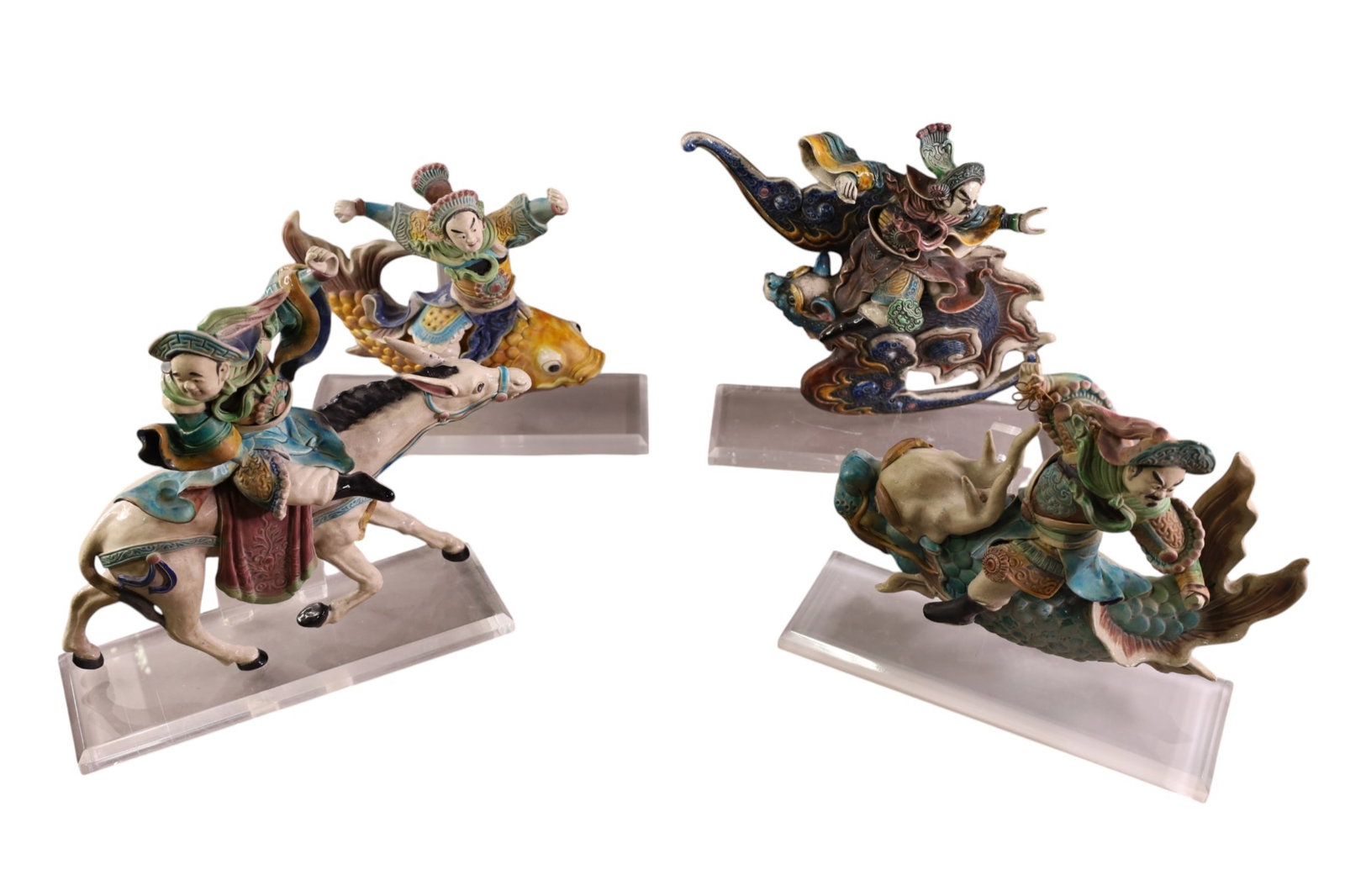 4 CHINESE ROOF TILES: 4 CHINESE FIGURAL ROOF TILES, CHINESE CERAMIC ROOF TILES. ON ACRYLIC BASES. SOME CHIPS. 14" H. THIS ITEM EXCEEDS SIZE OR WEIGHT LIMITATIONS FOR IN HOUSE SHIPPING, MUST BE PICKED UP IN HOUSE OR