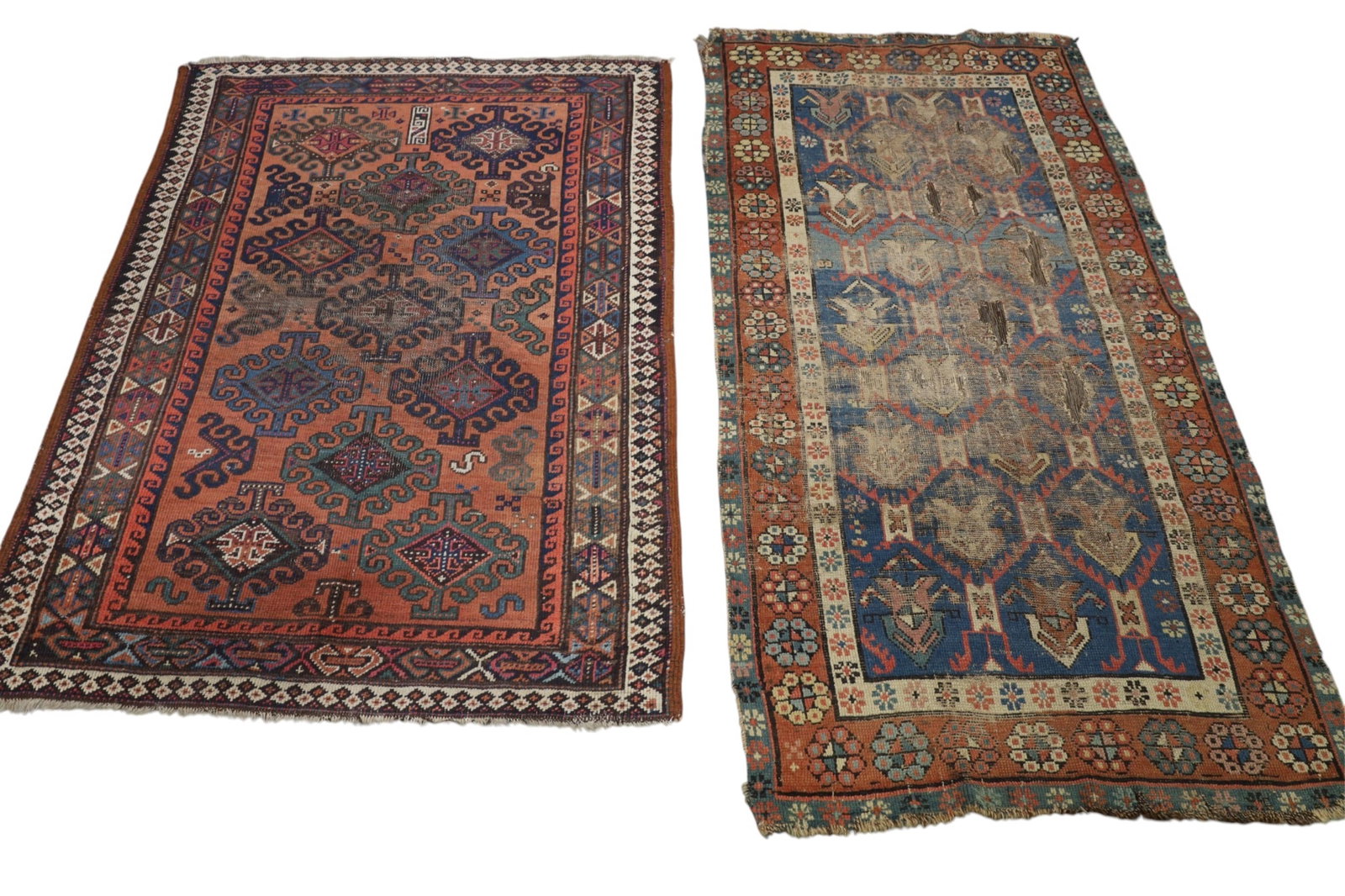 2 ANTIQUE PERSIAN RUGS: 2 ANTIQUE PERSIAN WOOL RUG FRAGMENTS. HOLES ADN AREAS OF LOW PILE. APPROX 4' 10" X 3' 4" & 5' 7" x 4' 9"