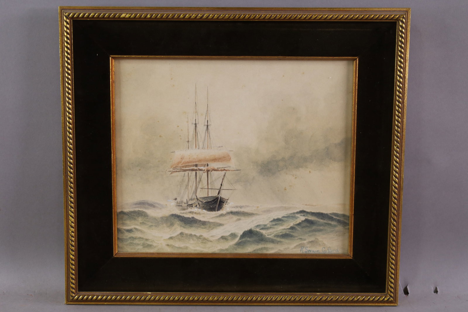 ROBERT SWAIN GIFFORD WATERCOLOR: WATERCOLOR ON PAPER, SIGNED LOWER RIGHT, UNDER GLASS, SHIP SCENE. 11 1/2" x 9 1/2" IMAGE SIZE / 16" x 14" IN FRAME, FOXING TO IMAGE. THE WORK IS OFFERED FROM A PRIVATE COLLECTION AND IS UNACCOMPANIED