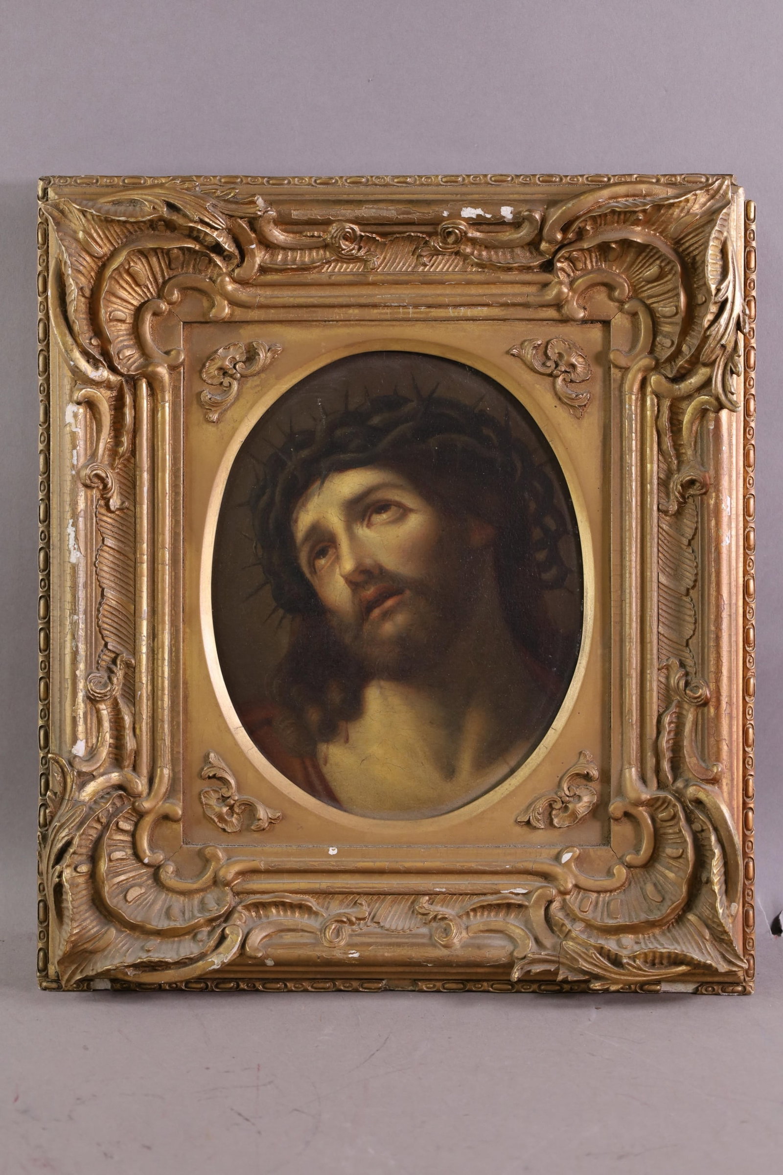 ANTIQUE RELIGIOUS OIL PAINTING: ATTRIBUTED TO ECCE HOMO OR BOLOGNESE ARTIST GUIDO RENI, IN GILT FRAME. 8" x 10" IMAGE SIZE / 14" x 16" IN FRAME . DAMAGE TO FRAME.
