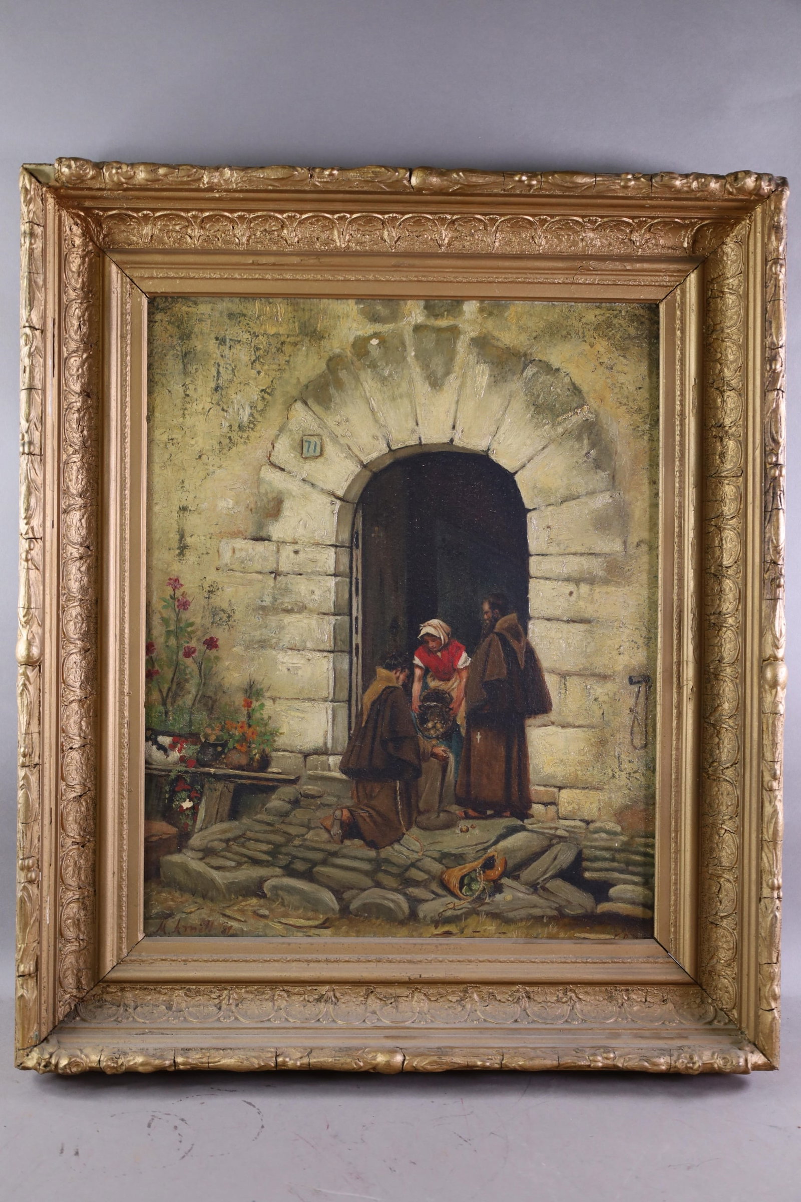 FRIARS AT THE DOOR OIL PAINTING: OIL ON CANVAS, SIGNED LOWER LEFT, ATTRIBUTED TO MANUEL AMELL Y JORDA, REPAIRS AND DAMAGE, SOME PAINT LOSS, 18" x 22" IMAGE SIZE / 24 1/2" x 28 1/2" IN FRAME. THE WORK IS OFFERED FROM A PRIVATE COLLECT