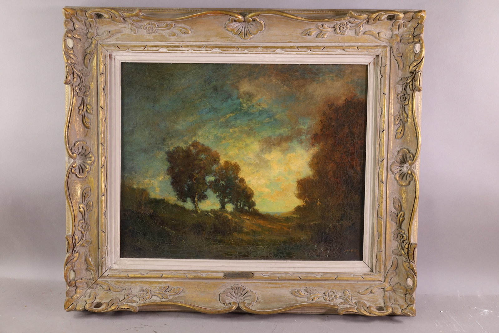 ROBERT G. MINOR OIL PAINTING: OIL ON CANVAS, SIGNED LOWER RIGHT, TITLED OAKS AT SUNSET, OLD RELINE, HEAVING CRAZING. 20" x 16 1/2" IMAGE SIZE / 27 1/2" x 23 3/4" IN FRAME