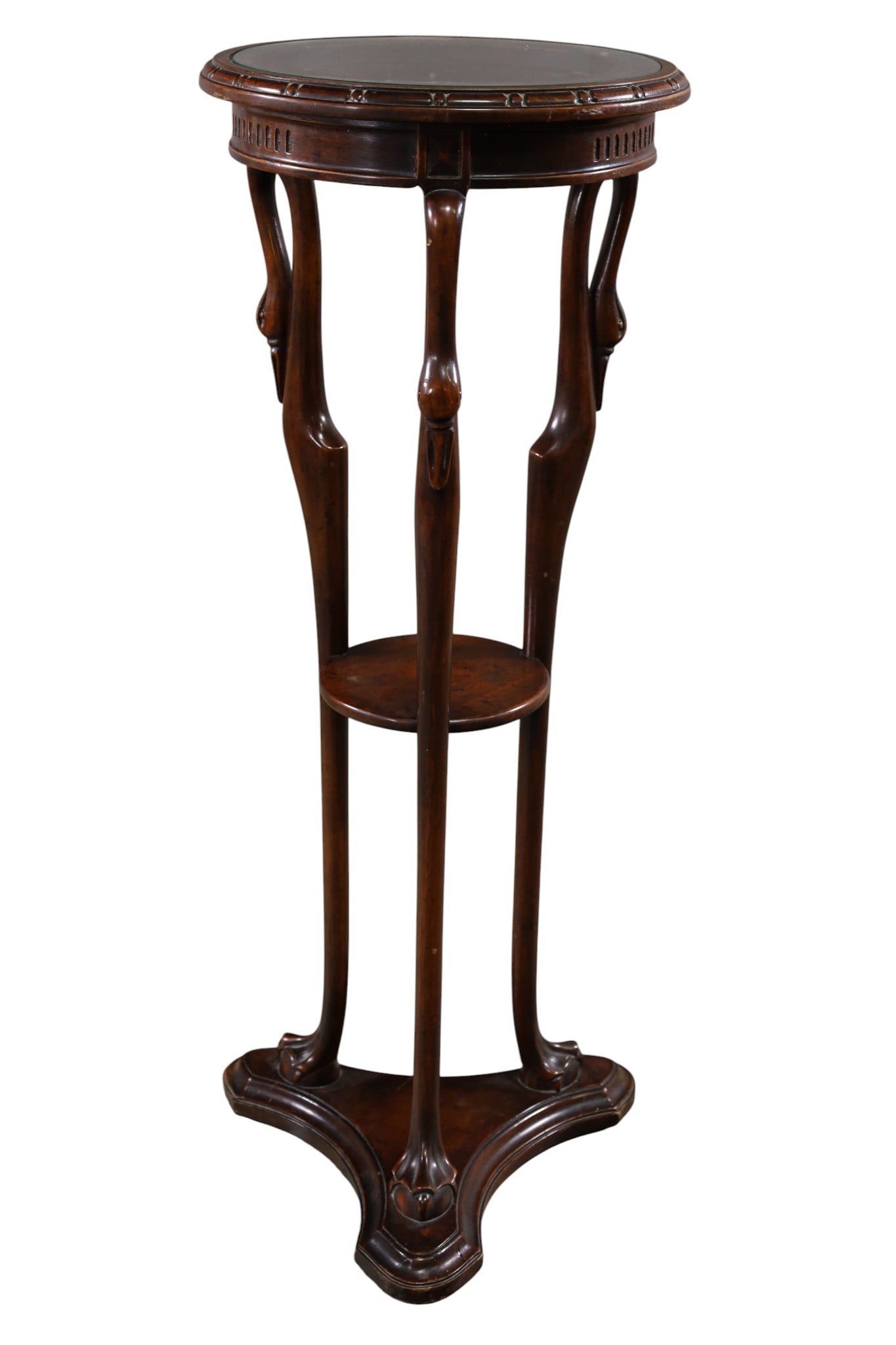 SWAN FORM FERN STAND: ORNATE CARVED FERN STAND, SWAN HEAD DECORATED, GLASS TOP. MINOR WEAR TO FINISH NEAR BASE. 13" DIAM x 36" H. THIS ITEM EXCEEDS SIZE AND WEIGHT LIMITATIONS FOR IN HOUSE SHIPPING, MUST BE PICKED UP IN