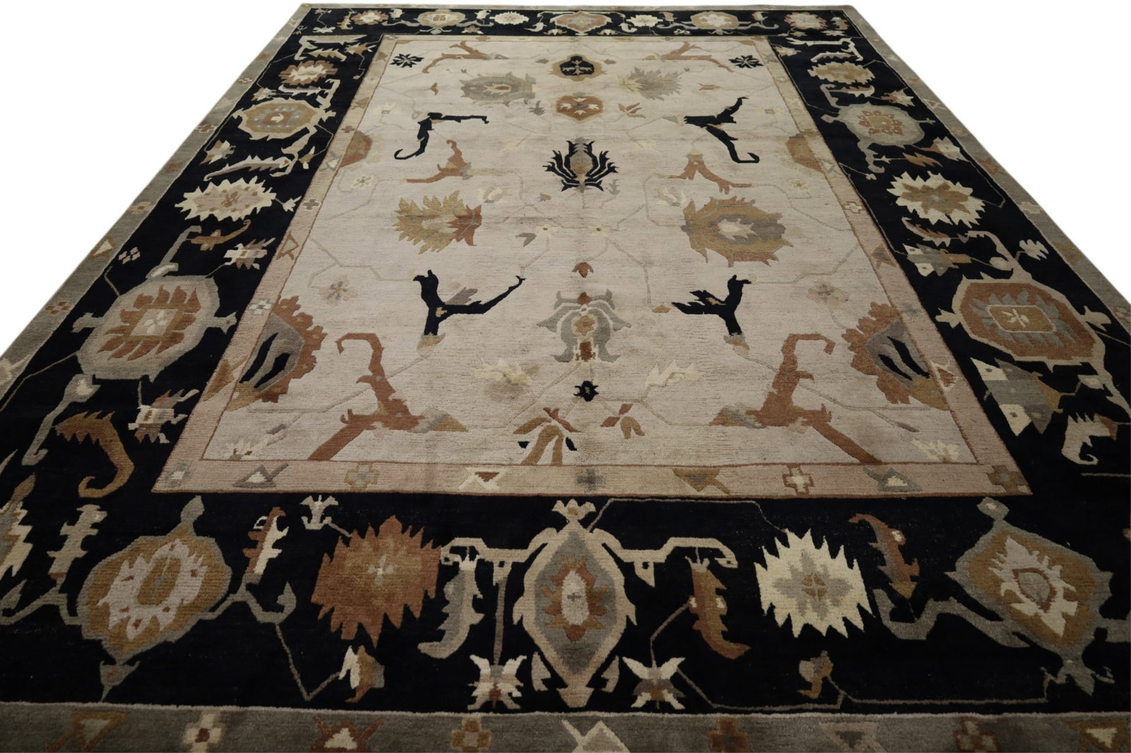 APPROX 11' 10" x 16' HANDMADE WOOL RUG: LARGE ROOMSIZE HANDMADE WOOL RUG. THIS ITEM EXCEEDS SIZE AND WEIGHT LIMITATIONS FOR IN HOUSE SHIPPING, MUST BE PICKED UP IN HOUSE OR SHIPPED VIA 3rd PARTY GROUND SHIPPER.
