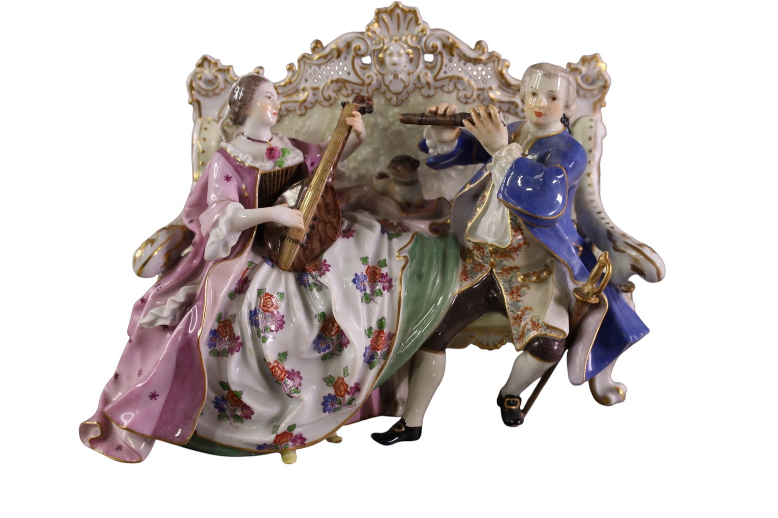 MEISSSEN GROUPING: MEISSEN PORCELAIN GROUPING, SEATED ON SOFA, DAMAGE TO INSTRUMENT. 9" W x 6" H.
