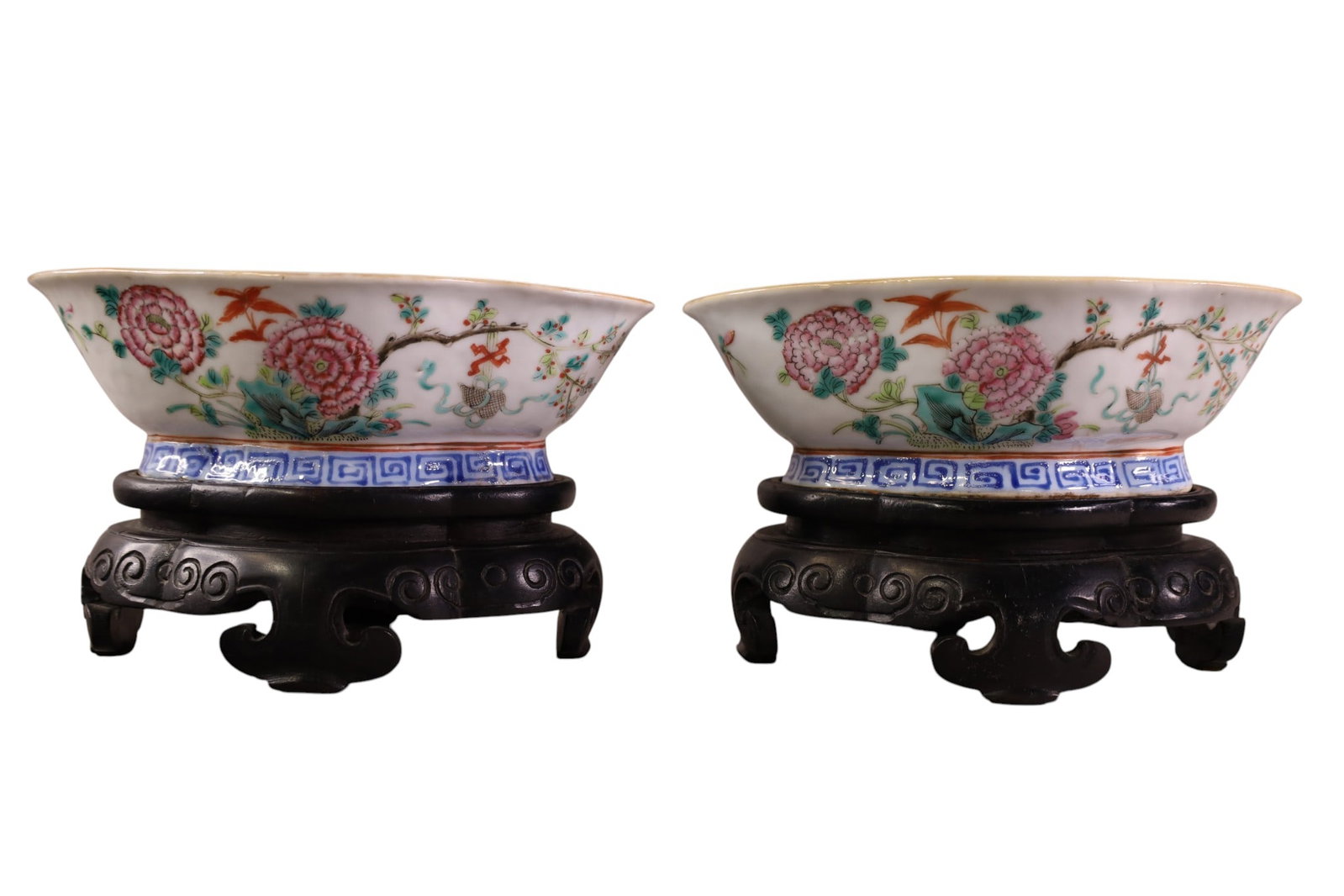 PAIR OF CHINESE PORCELAIN BOWLS: PAIR OF CHINESE EXPORT FAMILLE ROSE LOW BOWLS, ON WOODEN STANDS. 7" x 5 1/2"