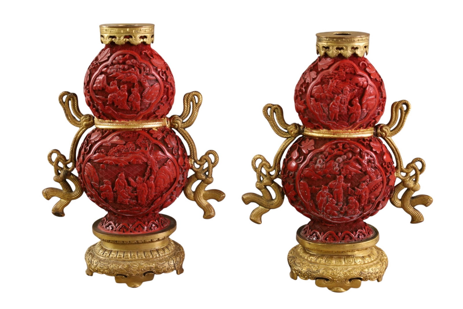 PAIR OF CHINESE CINNABAR VASES: PAIR OF CARVED CINNABAR & GILT METAL VASES WITH ROPE HANDLES. 9" H.