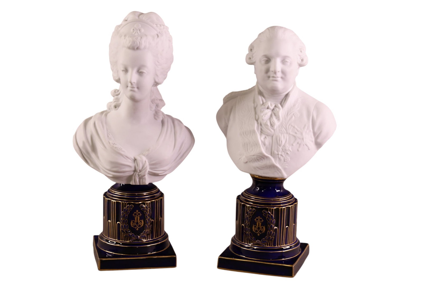 PAIR OF SEVRES BISQUE BUST: BISQUE BUST ON COBALT PORCELAIN BASE, MARIE ANTOINETTE, & KING LOUIS XVI, IMPRESSED MARK ON BASE. 14" H.