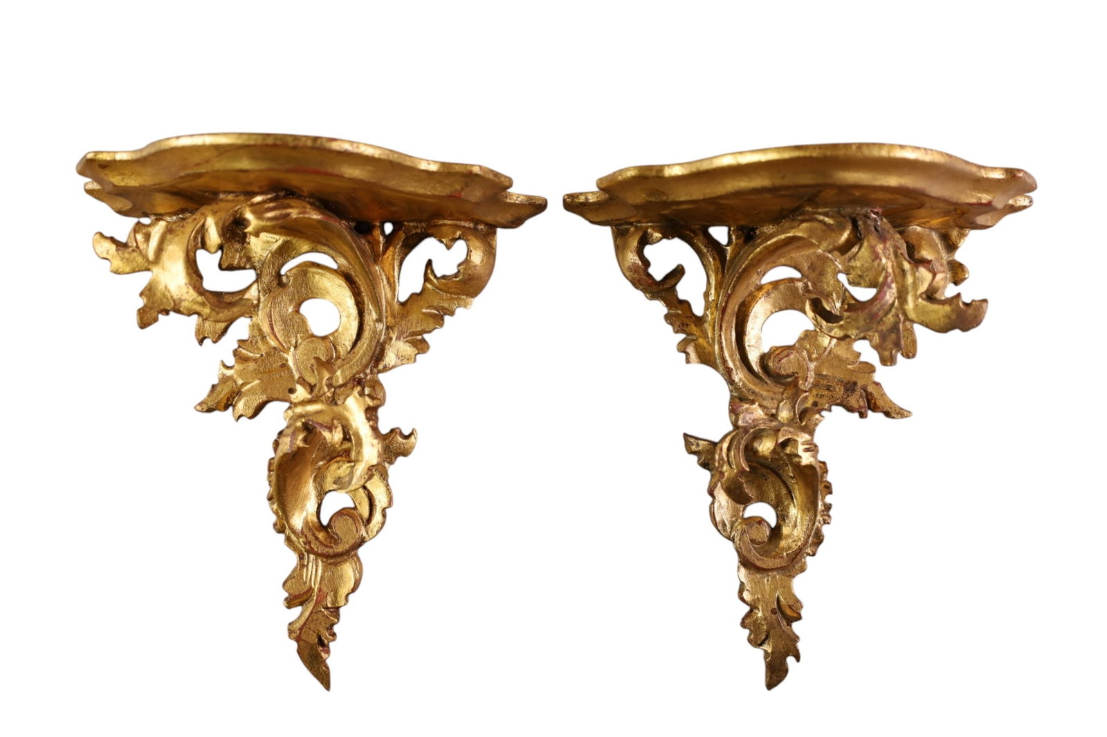 PAIR OF GILT WALL SHELVES: PAIR OF SMALL GOLD GILT GESSO WALL SHELVES. OLD REPAIRS. 8" W x 8 1/2" H.