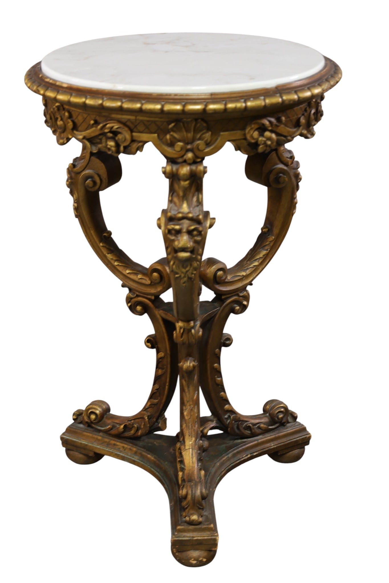 MARBLE TOP SIDE TABLE: GILT SIDE TABLE, MARBLE TOP, MISSING TRIM. BREAK TO ONE LEG. 17 1/2" DIAM x 28" H. THIS ITEM EXCEEDS SIZE AND WEIGHT LIMITATIONS FOR IN HOUSE SHIPPING, MUST BE PICKED UP IN HOUSE OR SHIPPED VIA 3rd