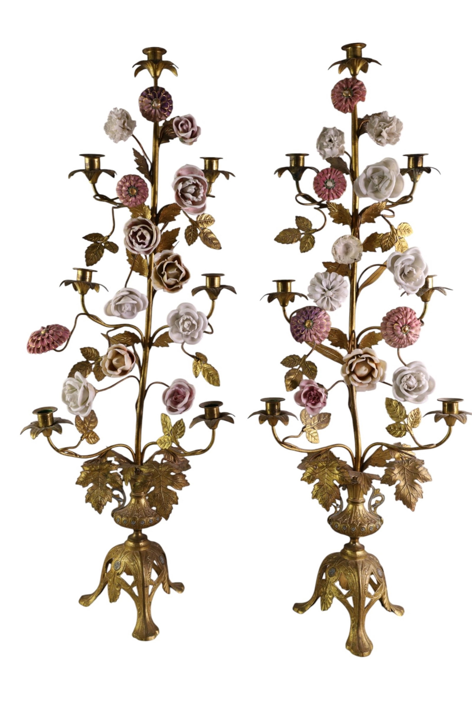 PAIR OF BRASS CANDELABRAS: PAIR OF LARGE BRASS, PORCELAIN, AND FLORAL DECORATED CANDELARBAS, MISSING ONE FLOWER. SOME CHIPS TO PORCELAIN FLOWERS. 36" H. THIS ITEM EXCEEDS SIZE AND WEIGHT LIMITATIONS FOR IN HOUSE SHIPPING, MUST