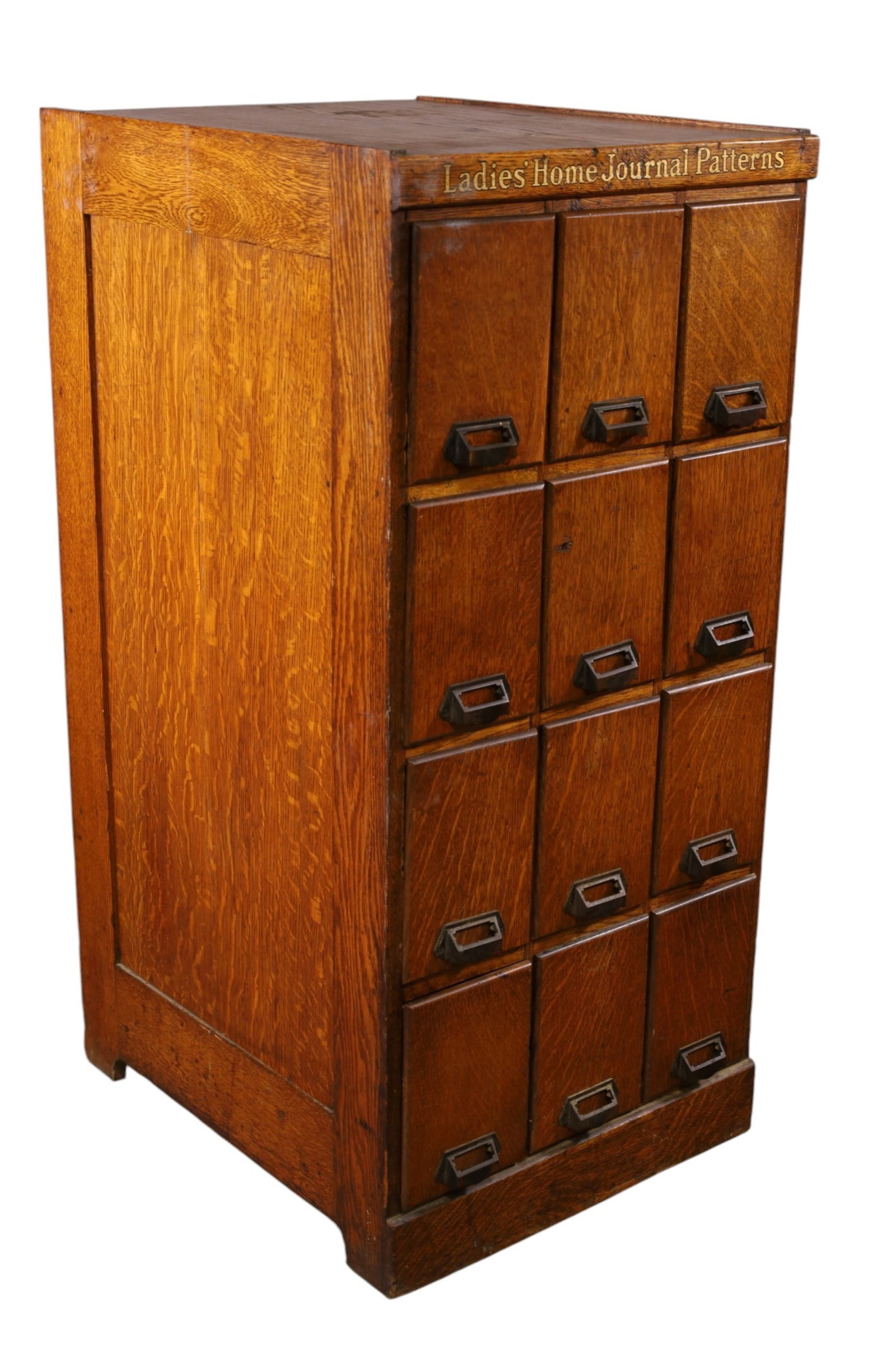 LADIES HOME JOURNAL PATTERN CABINET: AMERICAN OAK 12 DRAWER LADIES HOME JOURNAL PATTERN CABINET, MINOR WEAR TO FINISH. 21" W x 24" D x 44 1/2" H. THIS ITEM EXCEEDS SIZE AND WEIGHT LIMITATIONS FOR IN HOUSE SHIPPING, MUST BE PICKED UP IN