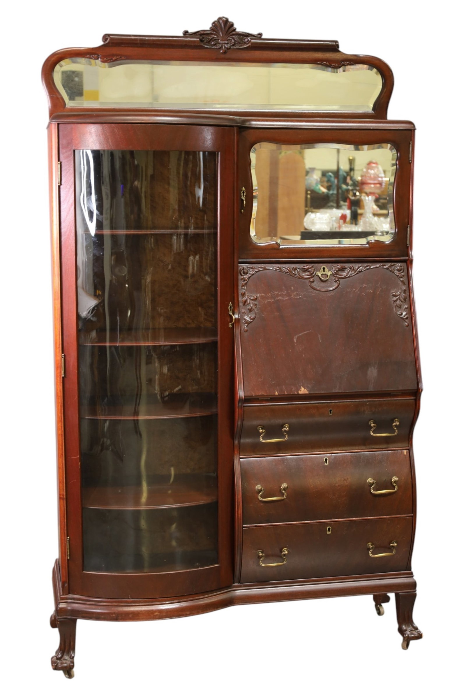 MAHOGANY SECRETARY: MAHOGANY DROP FRONT SECRETARY, BOW FRONT. WITH KEY. WEAR TO FINISH, VENEER DAMAGE. 42" W x 15" D x 74" H . THIS ITEM EXCEEDS SIZE AND WEIGHT LIMITATIONS FOR IN HOUSE SHIPPING, MUST BE PICKED UP IN