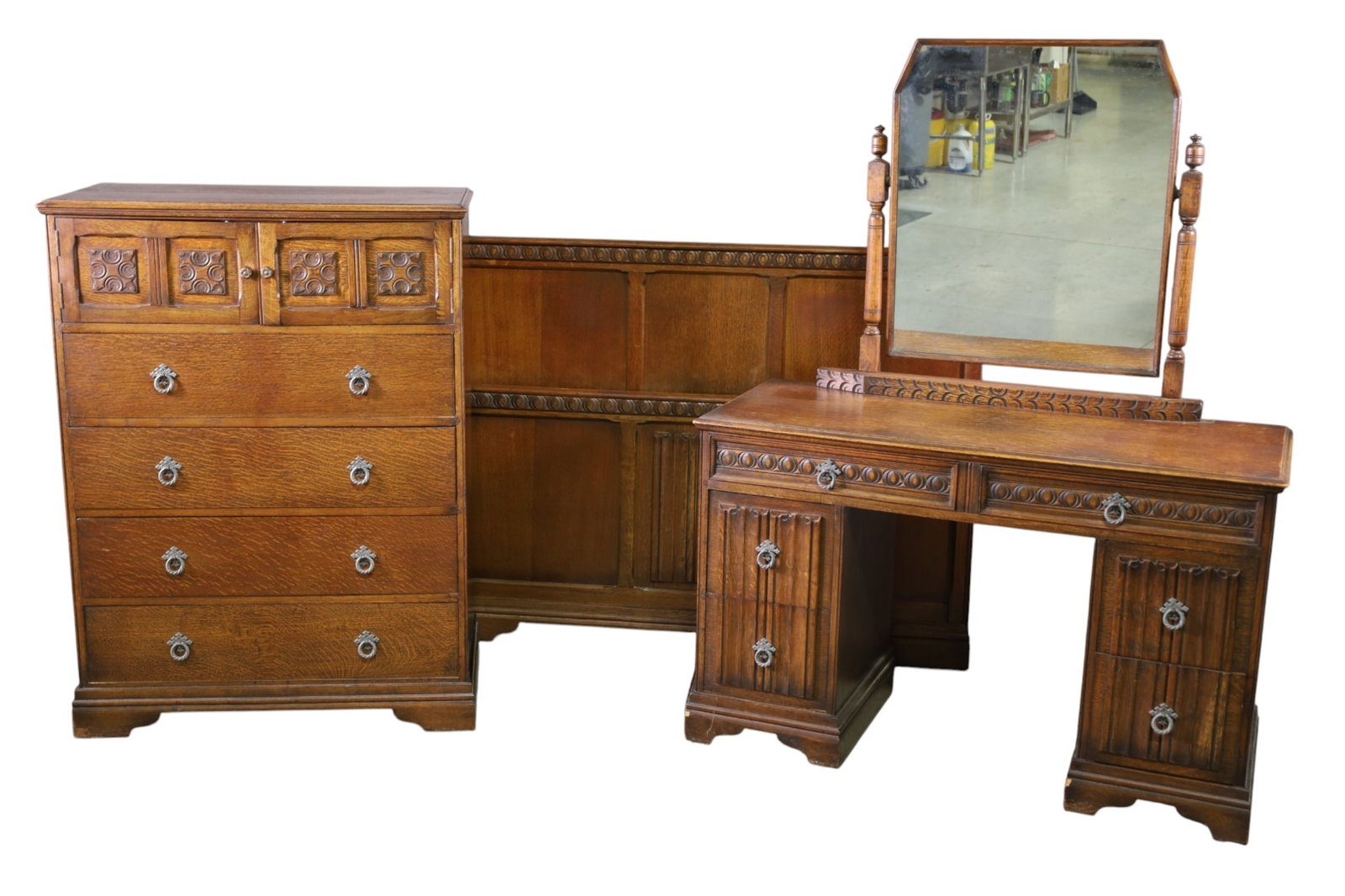 3 PIECE OAK BEDROOM SET: VANITY WITH MIRROR, HIGHBOY, & FULL SIZE BED (NO RAILS.). WEAR TO FINISH. 34" W x 19" D x 46" H. HIGHBOY, & 46" W x 19" D x 60" H VANITY, & 41" H HEADBOARD. THIS ITEM EXCEEDS SIZE AND WEIGHT