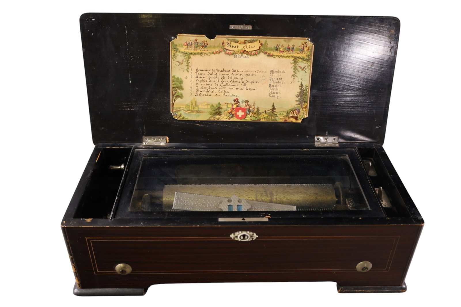 SWISS MUSIC BOX: INLAID CASE, SWISS MUSIC BOX. 8 SONG. WORKING CONDITION. 20" W x 9" D x 6 1/2" H.