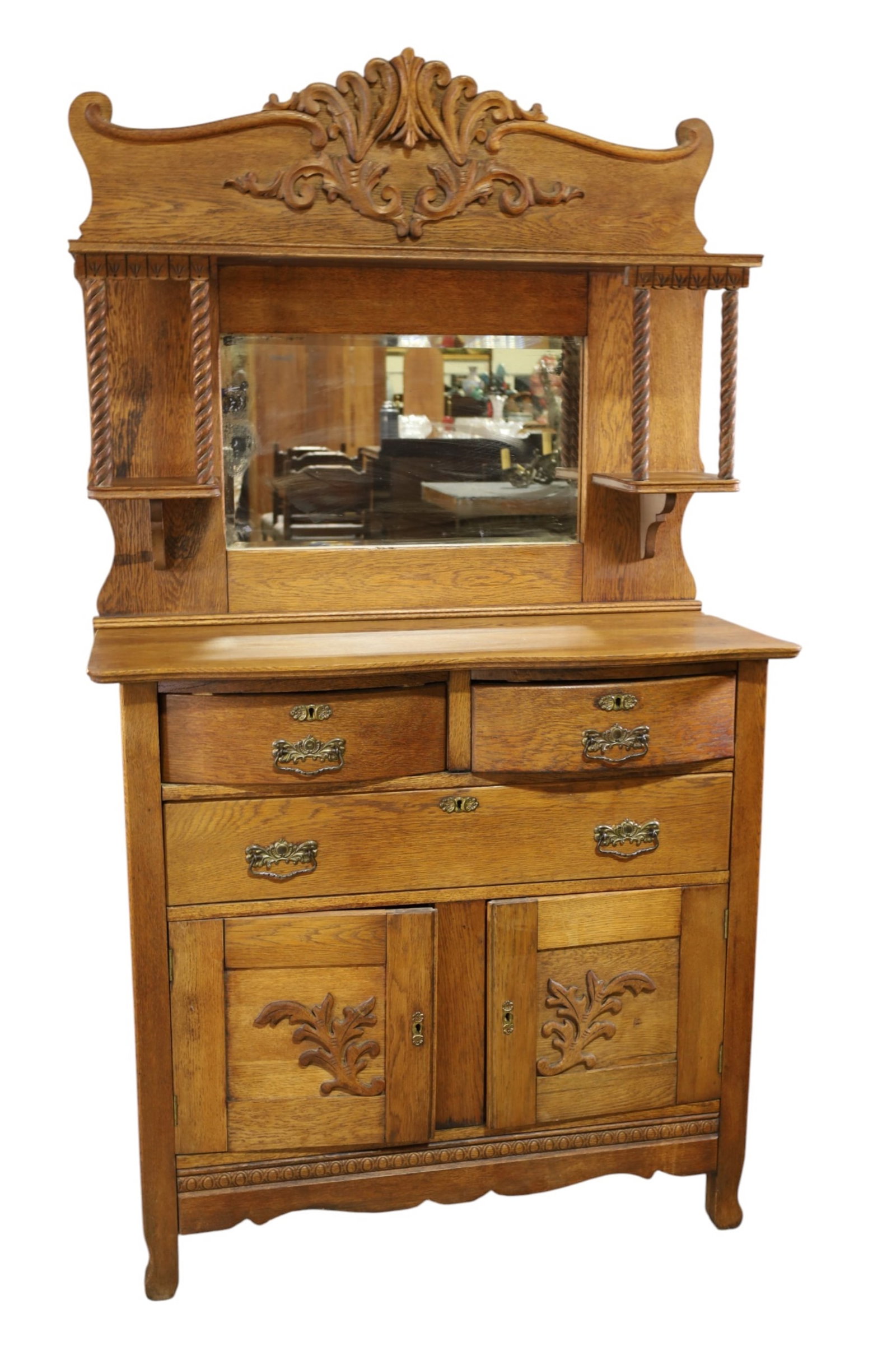 SMALL OAK SIDEBOARD: AMERICAN OAK SIDEBOARD, MIRRORED BACK, LOWER DRAWERS AND DOORS. MINOR WEAR TO FINISH. 40" W x 18" D x 72" H THIS ITEM EXCEEDS SIZE AND WEIGHT LIMITATIONS FOR IN HOUSE SHIPPING, MUST BE PICKED UP IN