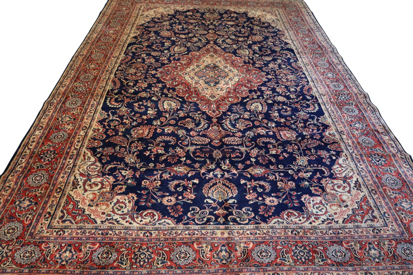 APPROX 9' 7" x 13' 4" HANDMADE WOOL RUG: HANDMADE WOOL RUG.