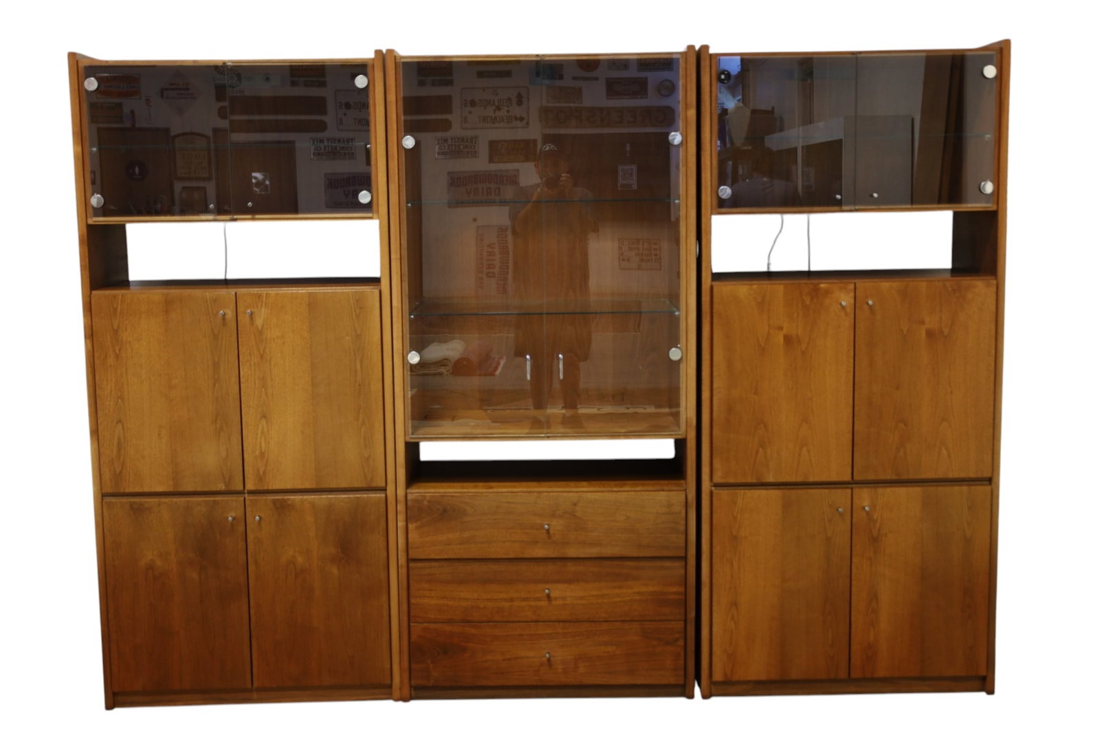 MID CENTURY MODERN WALL UNIT: 3 PART FREE STANDING MID CENTURY MODERN WALL UNIT, GLASS DOORS, INTERIOR SHELVES. MINOR WEAR TO FINISH. EACH SECTION 34" W x 18" D x 75" H. THIS ITEM EXCEEDS SIZE, WEIGHT, AND OR FRAGILITY