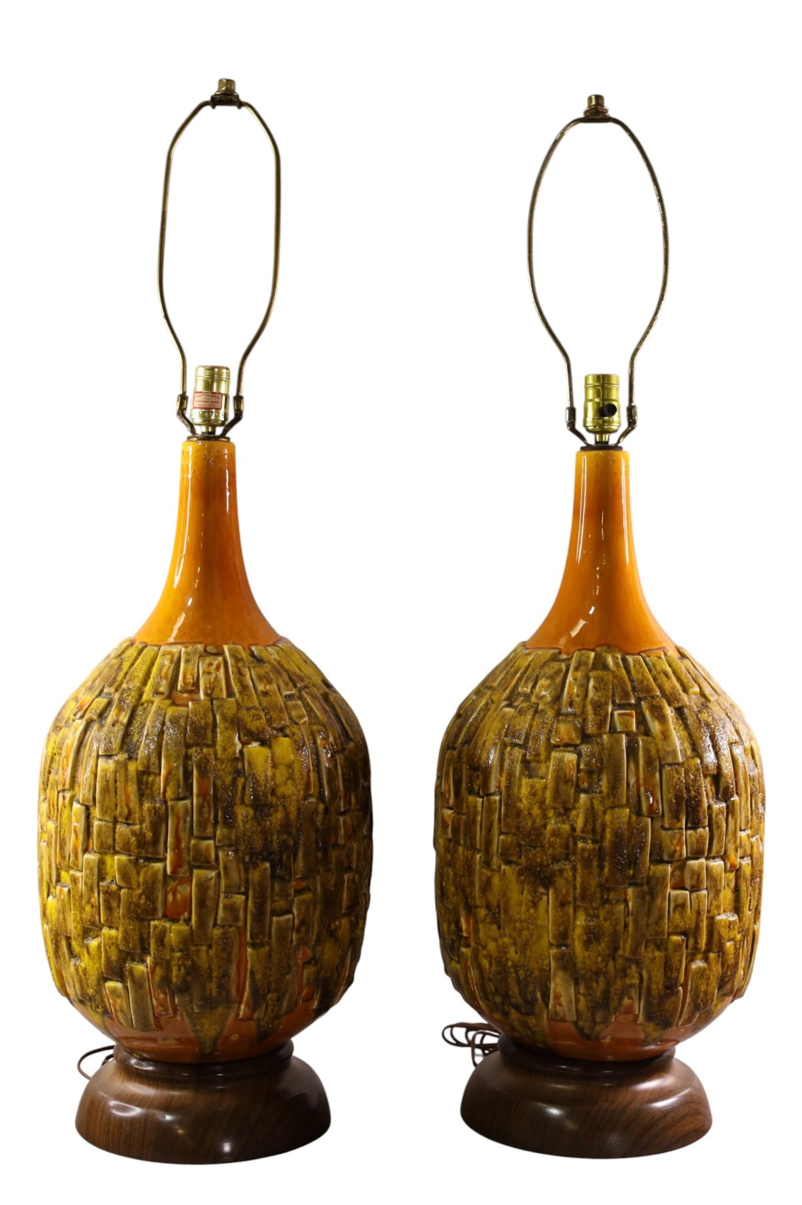 PAIR OF MID CENTURY MODERN TABLE LAMPS: PAIR OF LARGE CERAMIC MID CENTURY MODERN TABLE LAMPS, ON WOODEN BASES, SINGLE SOCKET. 39" H. THIS ITEM EXCEEDS SIZE, WEIGHT, AND OR FRAGILITY LIMITATIONS FOR IN HOUSE SHIPPING, MUST BE PICKED UP IN