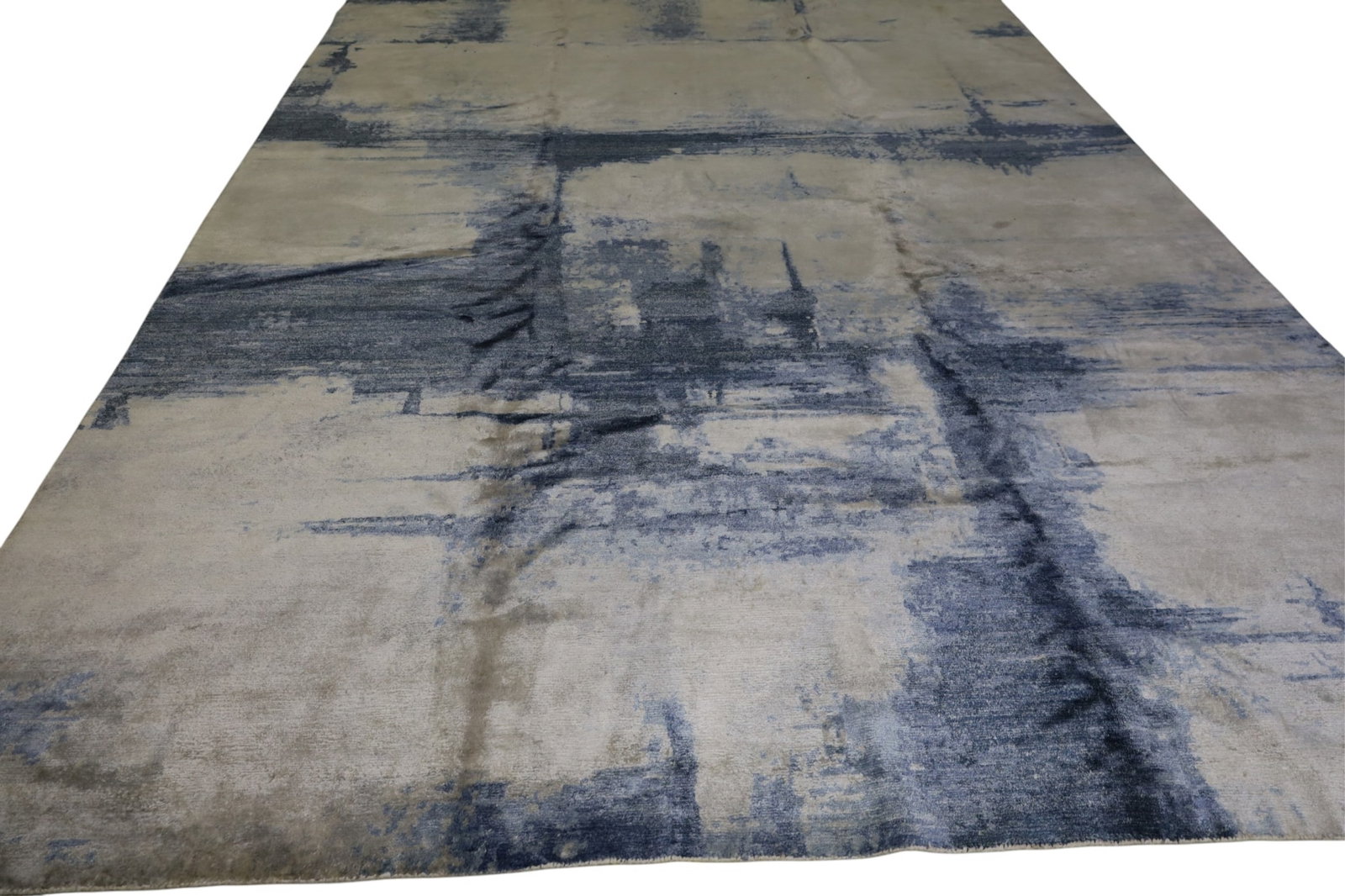 APPROX 8' 6" x 11' 4" HANDMADE WOOL RUG: HANDMADE WOOL RUG. STAINS. NEEDS CLEANED.