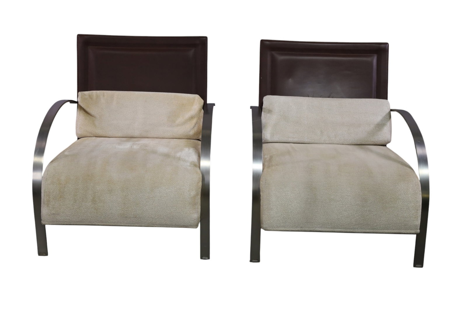 PAIR OF LHASA H22 ARMCHAIRS: PAIR OF HEAVY CURVED CHROME FRAMED ARMCHAIRS, DESIGNED BY DARIO GAGLIARDINI, LHASA H22. UNMARKED. 28" W x 25" D x 32" H. THIS ITEM EXCEEDS SIZE, WEIGHT, AND OR FRAGILITY LIMITATIONS FOR IN HOUSE