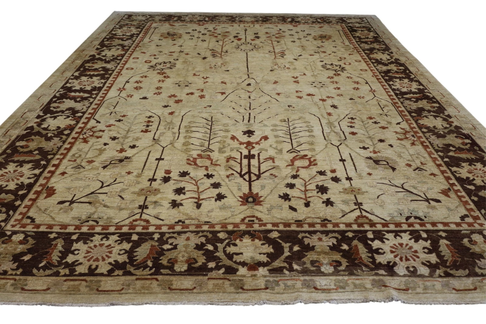 APPROX 12' X 17' 5" HANDMADE WOOL RUG: LARGE ROOM SIZE HANDMADE WOOL RUG. STAINS, ONE CORNER HAS BEEN REWOVEN. THIS ITEM EXCEEDS SIZE, WEIGHT, AND OR FRAGILITY LIMITATIONS FOR IN HOUSE SHIPPING, MUST BE PICKED UP IN HOUSE OR SHIPPED VIA