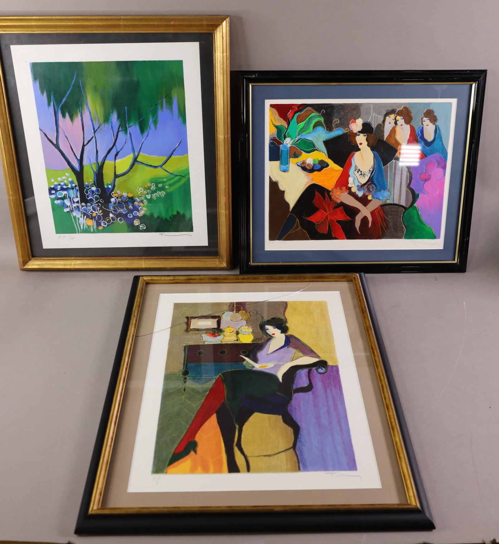 3 ITZCHAK TARKAY WALL HANGINGS: SERIGRAPH & SILKSCREEN, WOMAN AT TABLE, SIGNED AND NUMBERED & LANDSCAPE GREEN SERIGRAPH, 1/25. 13" x 15" & 17 1/2" x 20" IN FRAME & 13 1/2" x 11" IMAGE SIZE / 18 1/2" x 16" IN FRAME. & BROKEN GLASS