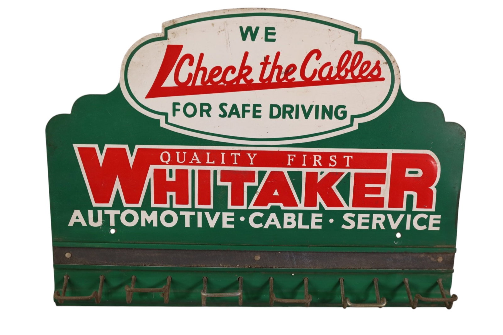 WHITAKER AUTOMOTIVE RACK SIGN: TIN WHITAKER AUTOMOTIVE CABLE RACK SIGN, WITH HANGERS. SCRATCHES. 17" x 12 1/2"