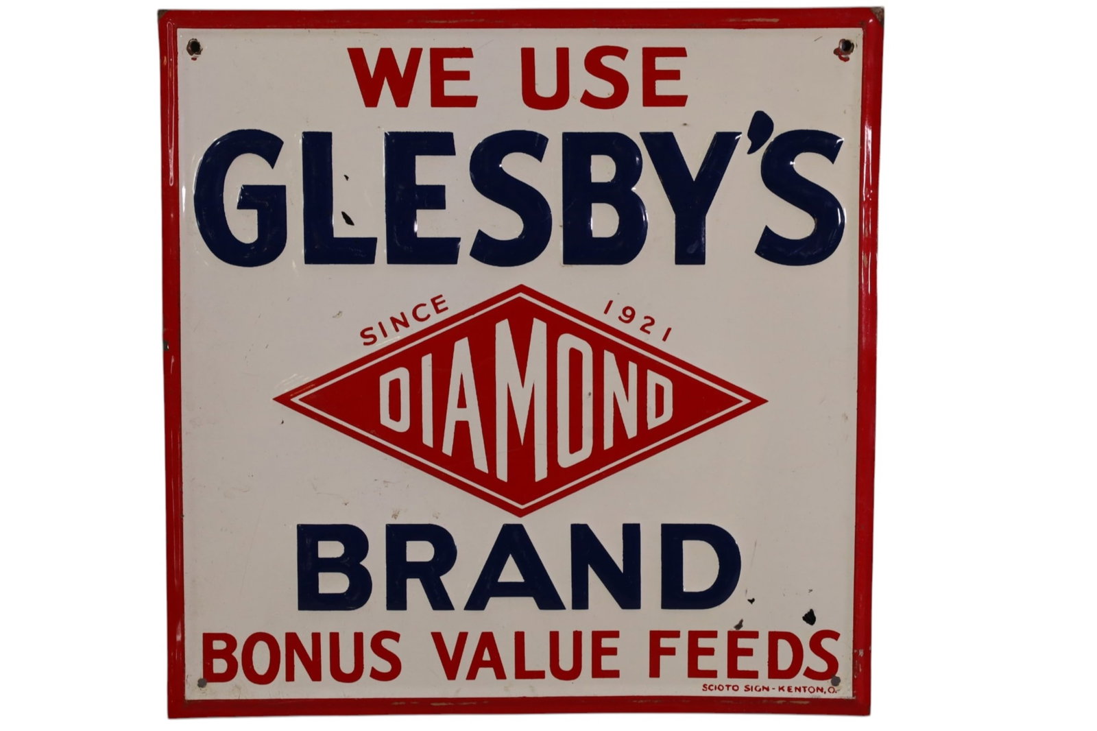 GLESBY'S DIAMOND BRAND METAL SIGN: SST EMBOSSED GLESBY'S DIAMOND BONUS BRAND FEEDS SIGN. 11 1/2" x 12"
