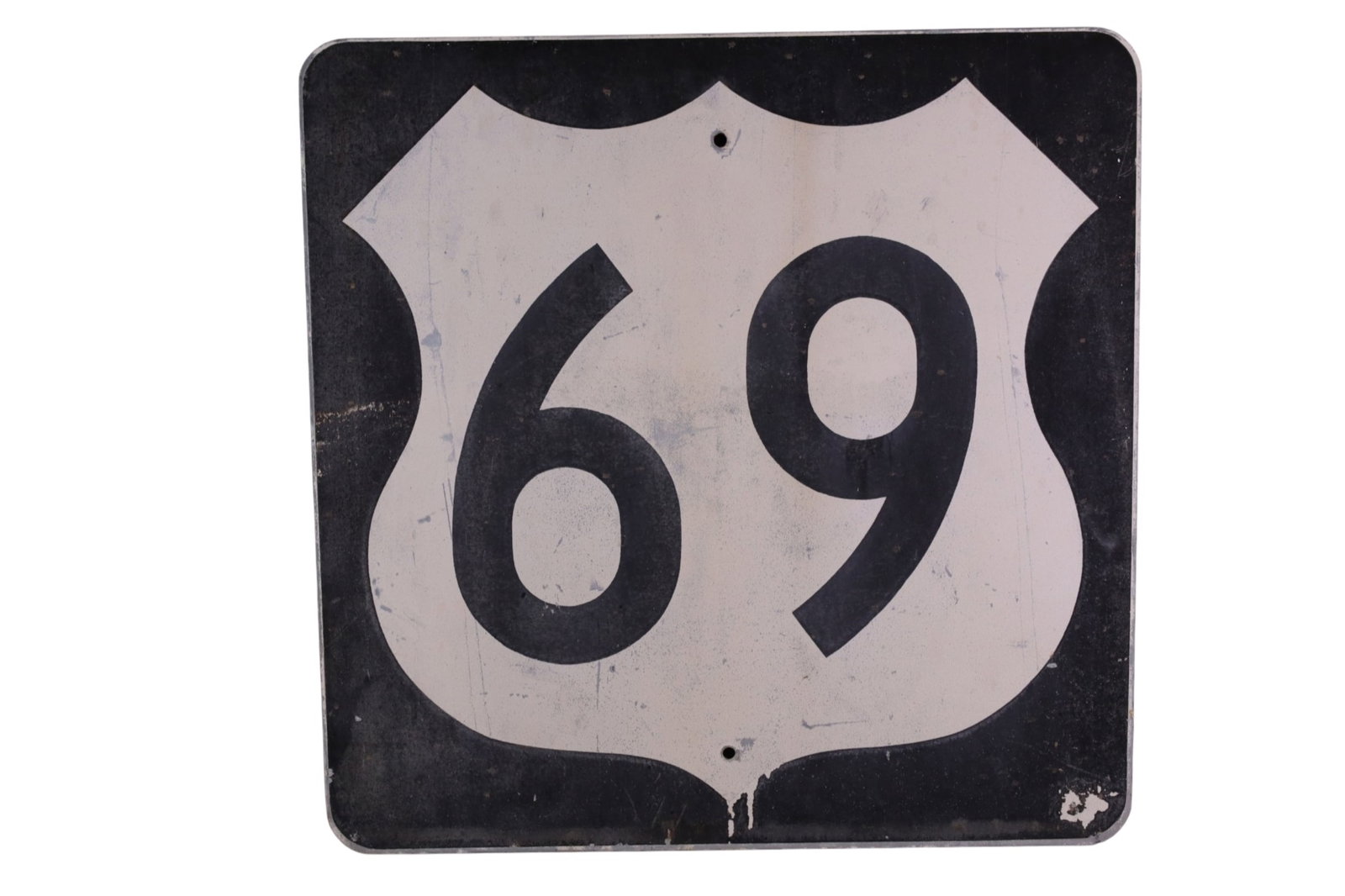 HIGHWAY 69 METAL ROAD SIGN: PAINTED METAL HIGHWAY 69 ROAD SIGN, PAINT LOSS, FADED. 24" x 24"