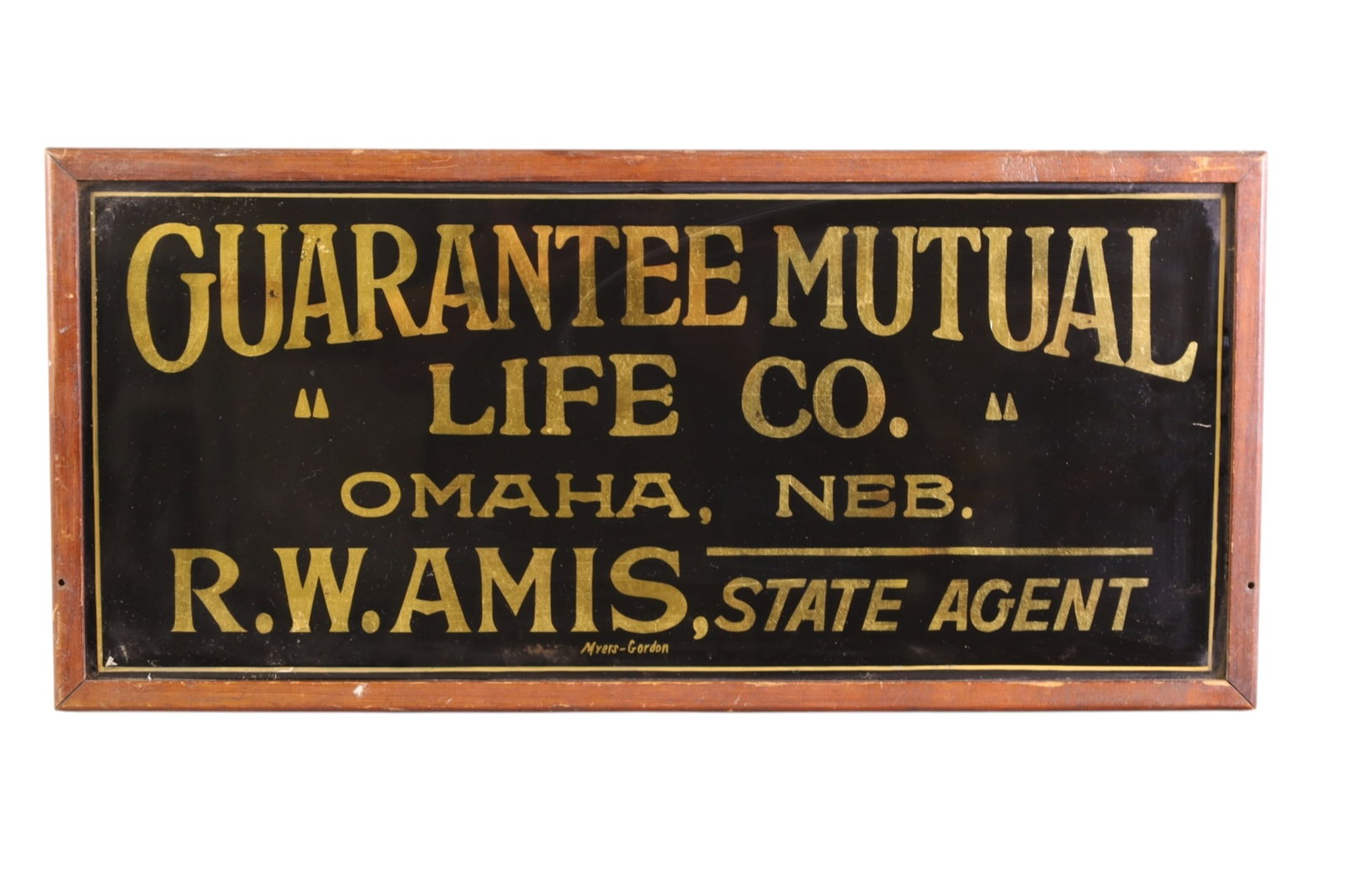 GUARANTEE MUTUAL LIFE CO AD: GUARANTEE MUTUAL LIFE CO, OMAHA NEBRASKA, AMIS AGENT, PAINTED GLASS AD. 26" x 12"