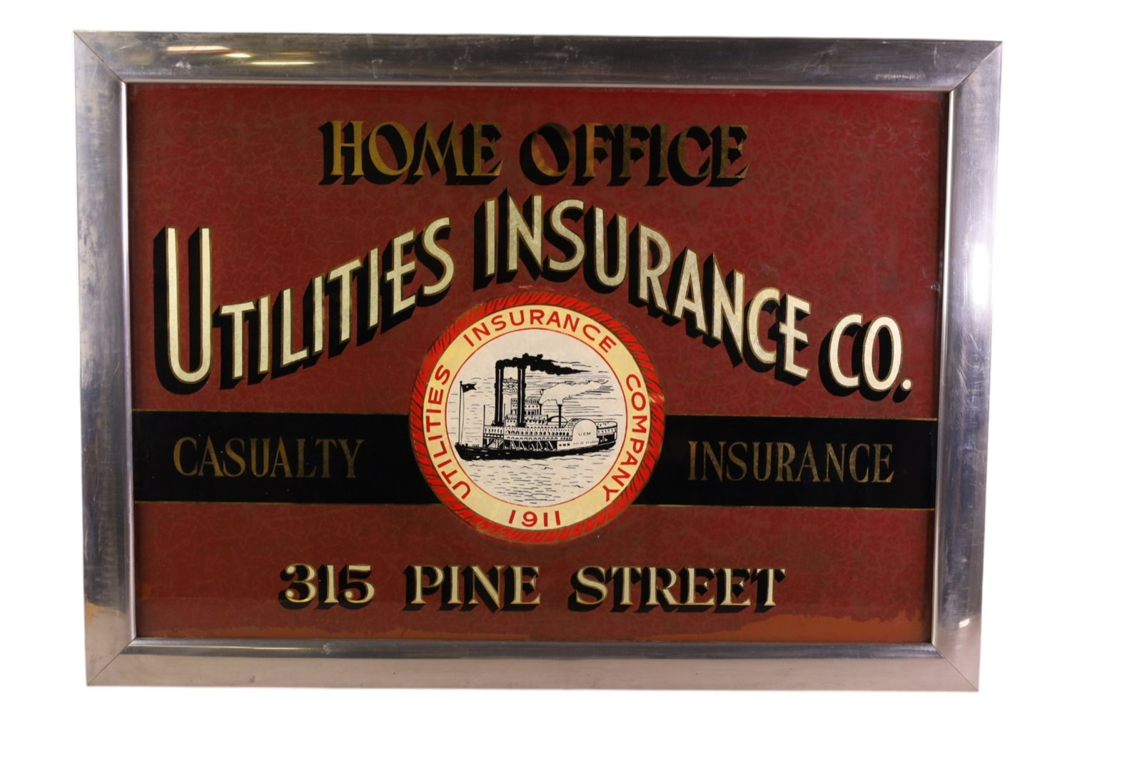 UTILITIES INSURANCE CO AD: UTILITIES INSURANCE CO, WITH GRAPHIC, PAINTED GLASS. PAINT LOSS. 36" x 26"