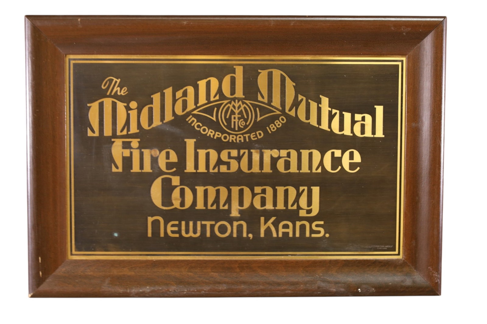MIDLAND MUTUAL FIRE INSURANCE CO SIGN: SST MIDLAND MUTUAL NEWTON KANSAS FIRE INSURANCE CO FRAMED AD. 21 1/2" x 15"