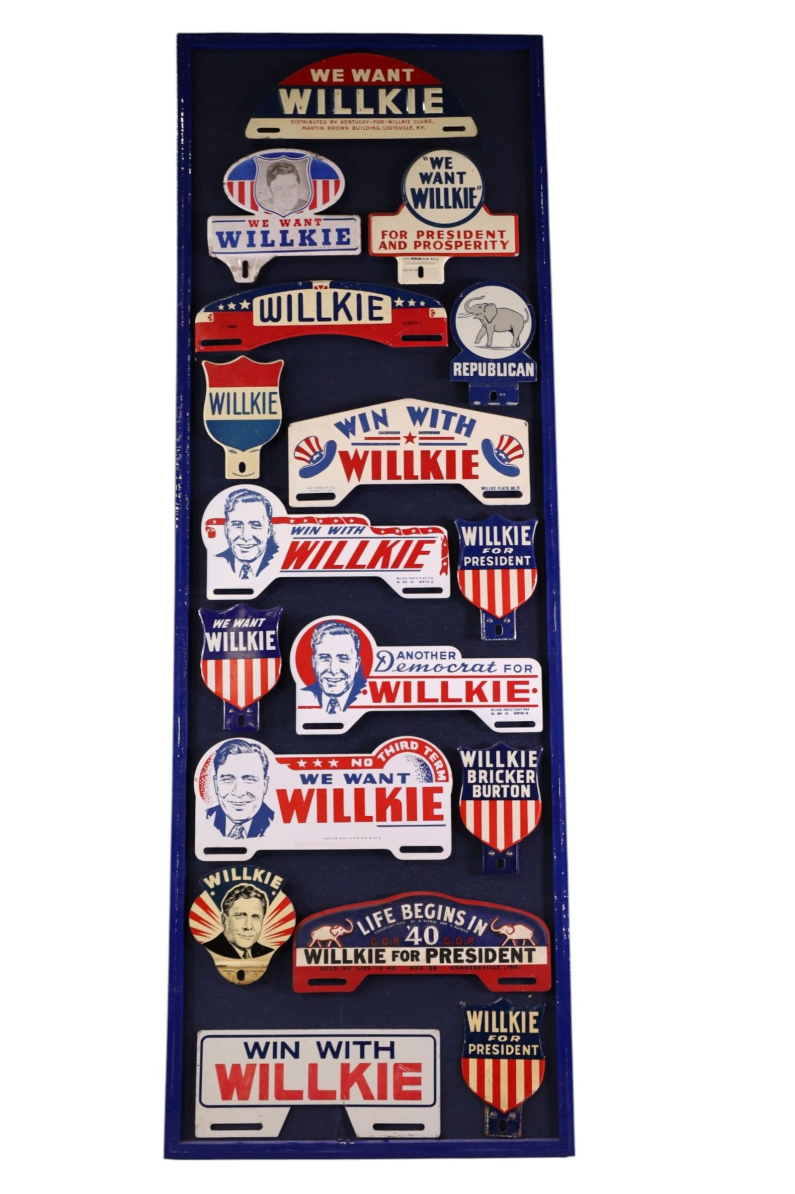 17 WILKE POLITICAL LICENSE PLATE TOPPERS: MOUNTED ON BOARD, WILKE POLITICAL LICENSE PLATE TOPPERS. 15" X 45" CAN BE REMOVED FOR SHIPPING.