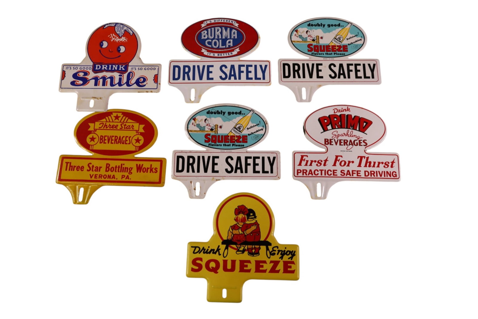 7 SODA LICENSE PLATE TOPPERS: BURMA, SQUEEZE, SMILE, AND MORE.