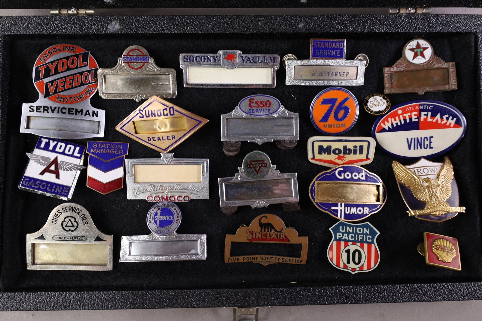 COLLECTION OF SERVICE STATION HAT BADGES: INCLUDING SINLCAIR, FLYING A, MOBIL, AND MORE. SHOWCASE NOT INCLUDED.