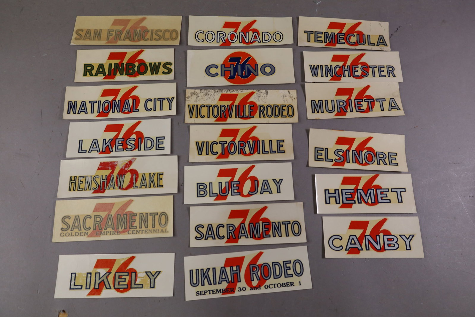 20 UNION 76 WATER TRANSFER DECALS: INCLUDING, SAN FRANCISCO, NATIONAL CITY, CORONADO AND MORE. EDGES ARE CURLED.