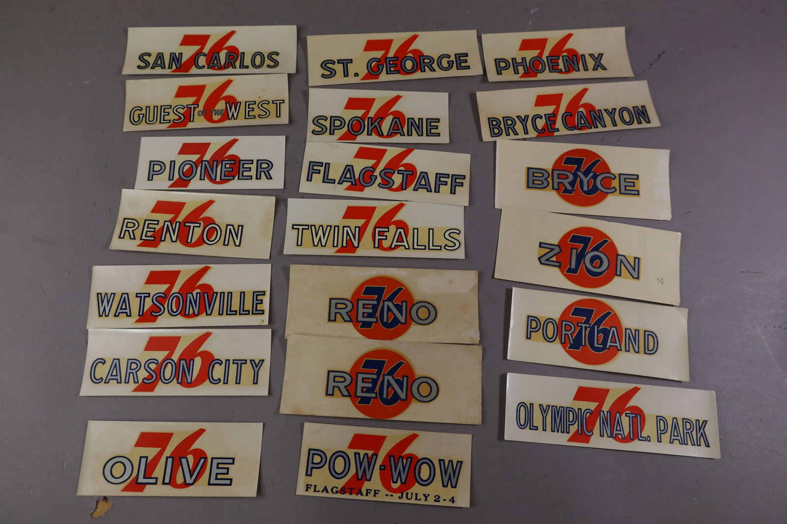 20 UNION 76 WATER TRANSFER DECALS: INCLUDING, OLYMPIC NATIONAL PARK, ZION, PORTLAND, AND MORE. EDGES ARE CURLED.