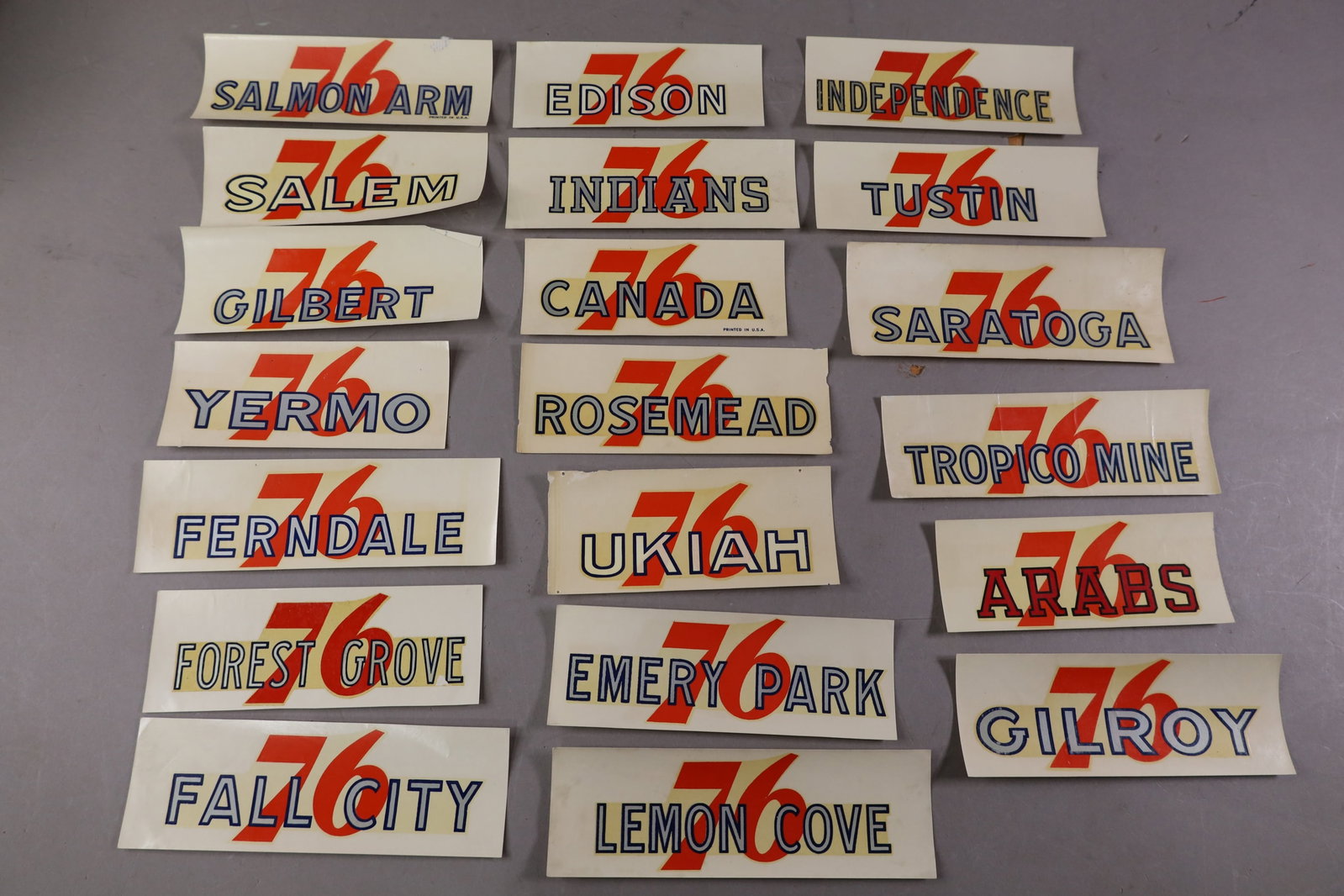 20 UNION 76 WATER TRANSFER DECALS: INCLUDING, GILROY, CANADA, TUSTIN AND MORE. EDGES ARE CURLED.