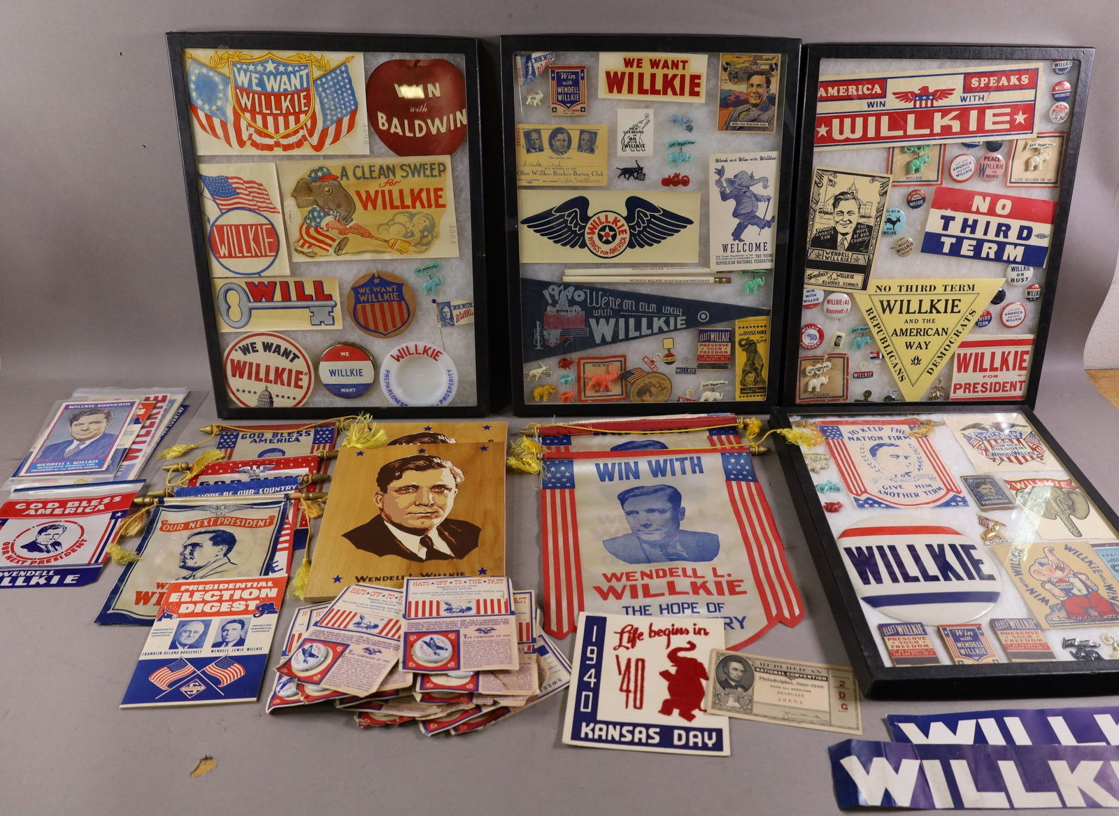 WILLKIE POLITICAL ITEMS: 4 CASES OF PIN BACKS AND EPHEMERA, CASES INCLUDED.
