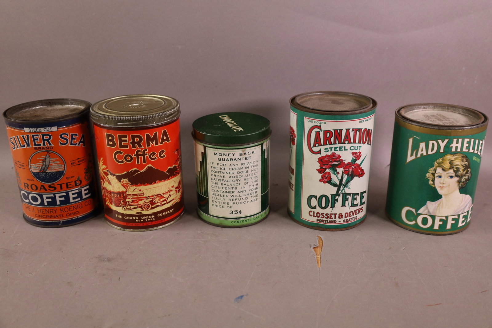 7 ADVERTISING TINS - 4