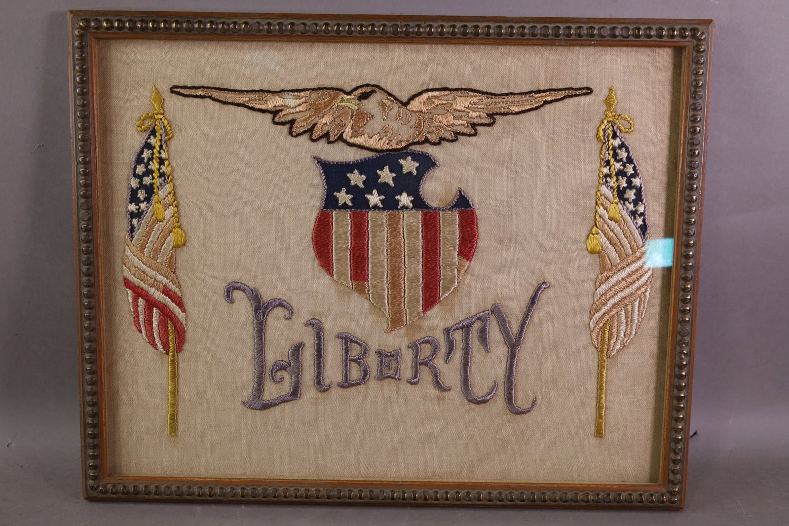 FRAMED WOOLIE: FRAMED LIBERTY WOOLIE, 19" X 15"
