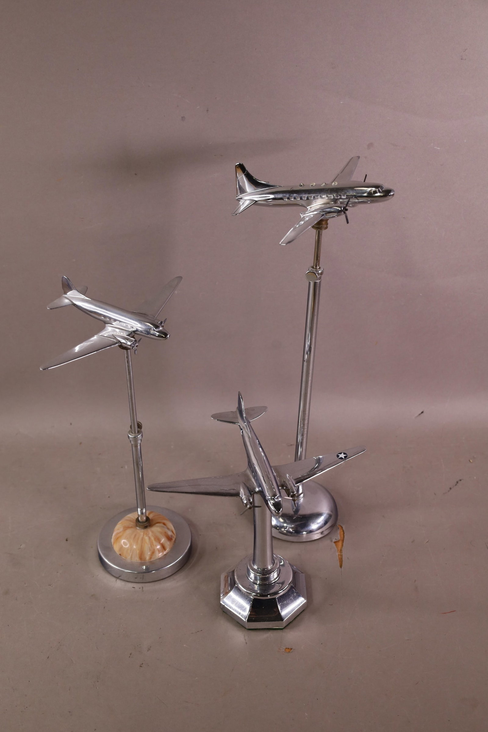 3 ART DECO STYLE AIRPLANE MODELS: 2 ARE ON TELESCOPIC BASES. 8" - 17" H.