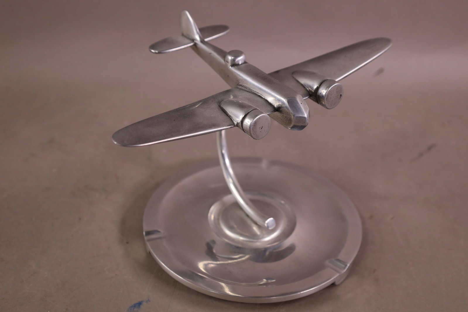 ALUMINUM AIRLINE ASHTRAY: AIRLINE MODEL ASHTRAY. 9" W.