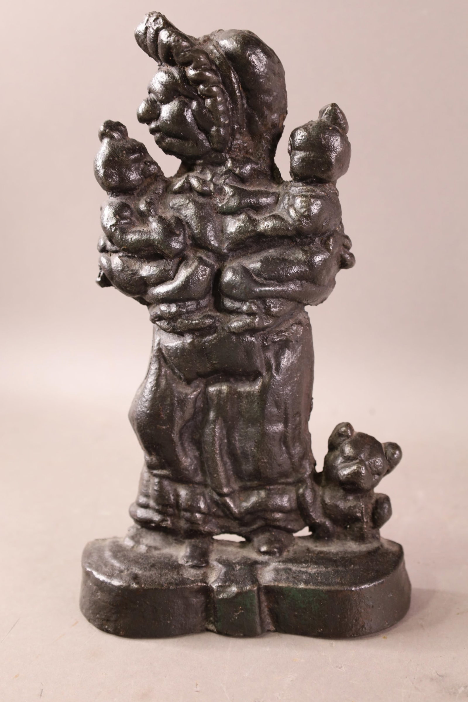2 CAST IRON DOORSTOPS - 2